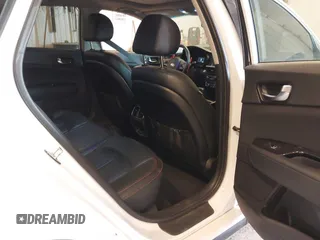 2018 Kia Optima SX with VIN 5XXGW4L27JG237960, listed as a IAAI auction lot 41956461 with 87,085 mi miles and . Bid and sale history available at DreamBid. Image 8.