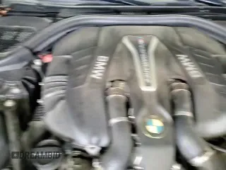 2018 BMW 5 Series M550i xDrive with VIN WBAJB9C54JB286660, listed as a Copart auction lot 62594805 with 137,794 mi miles and Salvage title. Bid and sale history available at DreamBid. Image 13.