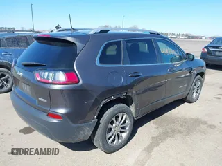 2019 Jeep Cherokee Latitude Plus with VIN 1C4PJLLB1KD201847, listed as a IAAI auction lot 41814463 with 115,927 mi miles. Bid and sale history available at carsss.com. Image 4.