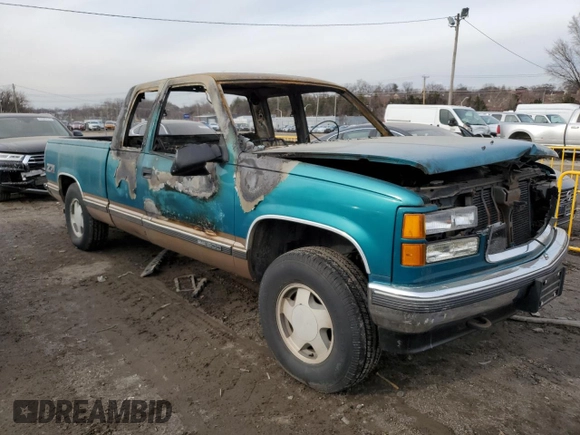 1995 GMC Sierra 1500 z VIN 2GTEK19K0S1570324, wystawiony jako Copart lot #43065205 z przebiegiem Nie podano mil oraz Szkody całkowita. Historia ofert i sprzedaży dostępna na DreamBid. Obrazek 4.