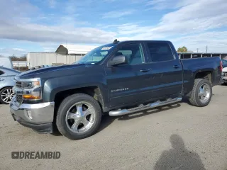 2018 Chevrolet Silverado 1500 LT with VIN 3GCPCREC6JG337086, listed as a Copart auction lot 43741955 with 87,783 mi miles and Salvage Title. Bid and sale history available at DreamBid. Image 1.