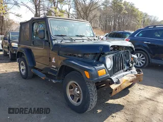 2003 Jeep Wrangler X with VIN 1J4FA39S53P362991, listed as a IAAI auction lot 41607212 with 240,556 mi miles. Bid and sale history available at carsss.com. Image 1.