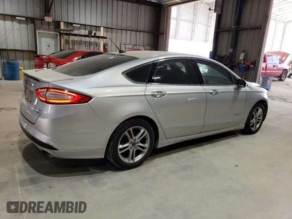 2016 Ford Fusion Titanium Hybrid with VIN 3FA6P0RUXGR355351, listed as a Copart auction lot 56516025 with 117,964 mi miles and Salvage title. Bid and sale history available at DreamBid. Image 3.