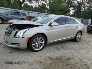 2014 Cadillac XTS Luxury with VIN 2G61M5S32E9230569, listed as a Copart auction lot 63106785 with 81,446 mi miles and Salvage title. Bid and sale history available at DreamBid. Image 1.