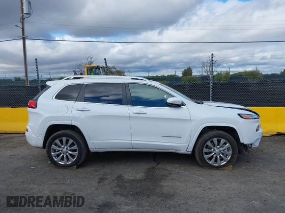 2017 Jeep Cherokee Overland z VIN 1C4PJMJS9HW631941, wystawiony jako IAAI lot #41605184 z przebiegiem 19 162 mil mil oraz . Historia ofert i sprzedaży dostępna na DreamBid. Obrazek 14.