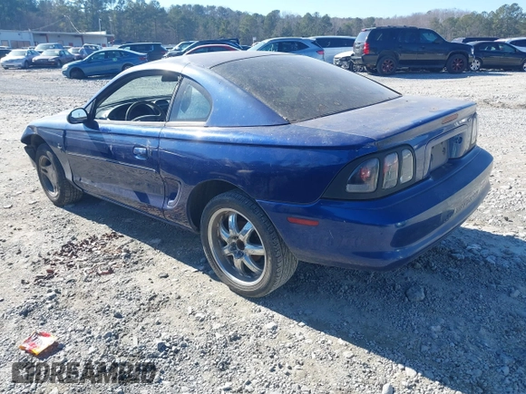 1996 Ford Mustang with VIN 1FALP4042TF140884, listed as a IAAI auction lot 41279611 with 233,047 mi miles. Bid and sale history available at carsss.com. Image 3.