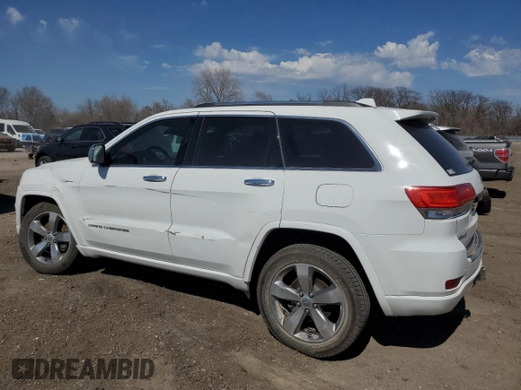 2014 Jeep Grand Cherokee Overland with VIN 1C4RJFCT7EC105296, listed as a Copart auction lot 50822775 with 180,067 mi miles and Salvage Title. Bid and sale history available at DreamBid. Image 2.