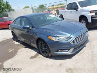 2018 Ford Fusion Hybrid SE with VIN 3FA6P0LU9JR137983, listed as a IAAI auction lot 42087894 with 196,330 mi miles. Bid and sale history available at carsss.com. Image 1.
