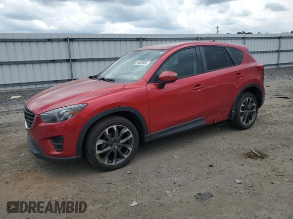 2016 Mazda CX-5 Grand Touring with VIN JM3KE4DY0G0664379, listed as a Copart auction lot 54659005 with 116,022 mi miles and Salvage Title. Bid and sale history available at DreamBid. Image 1.