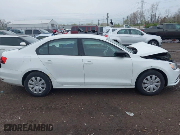 2015 Volkswagen Jetta Sedan 2.0L S with VIN 3VW2K7AJ5FM313969, listed as a IAAI auction lot 41951550 with 104,735 mi miles. Bid and sale history available at carsss.com. Image 13.