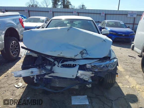 2013 BMW 3 Series 320i with VIN WBA3B1C56DF462549, listed as a IAAI auction lot 41411287 with 119,146 mi miles. Bid and sale history available at carsss.com. Image 12.