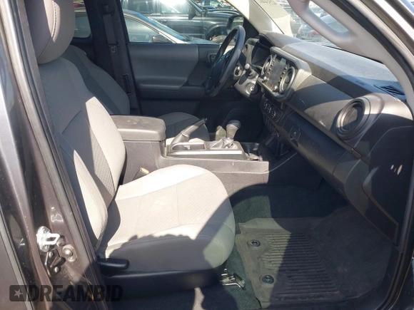 2022 Toyota Tacoma SR with VIN 3TYRX5GN3NT066696, listed as a IAAI auction lot 42514462 with 35,687 mi miles and . Bid and sale history available at DreamBid. Image 5.