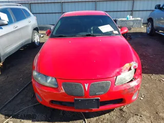 2004 Pontiac GTO with VIN 6G2VX12GX4L200140, listed as a IAAI auction lot 41337182 with 109,405 mi miles. Bid and sale history available at carsss.com. Image 12.