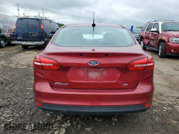 2017 Ford Focus SE with VIN 1FADP3F2XHL298662, listed as a Copart auction lot 58179365 with 77,623 mi miles and Clean title. Bid and sale history available at DreamBid. Image 6.