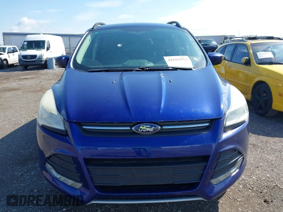 2014 Ford Escape SE with VIN 1FMCU9GX1EUB52373, listed as a IAAI auction lot 42163933 with 128,634 mi miles. Bid and sale history available at carsss.com. Image 6.