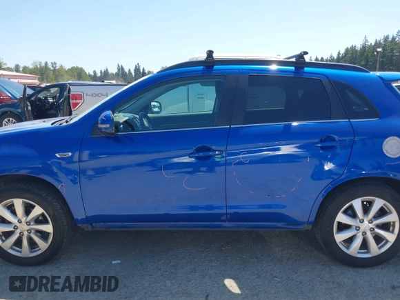 2015 Mitsubishi Outlander GT with VIN 4A4AR4AWXFE047335, listed as a IAAI auction lot 42720990 with 164,672 mi miles and . Bid and sale history available at DreamBid. Image 15.