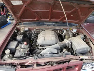 2002 Isuzu Rodeo S z VIN 4S2CK58W924328997, wystawiony jako Copart lot #41454525 z przebiegiem 110 569 mil mil oraz Szkoda całkowita • Salvage title. Historia ofert i sprzedaży dostępna na DreamBid. Obrazek 11.