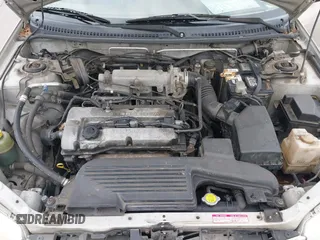 2000 Mazda Protege DX with VIN JM1BJ2223Y0212144, listed as a IAAI auction lot 41570436 with 221,430 mi miles and . Bid and sale history available at DreamBid. Image 10.
