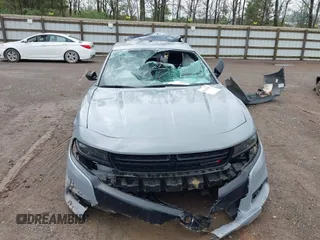 2022 Dodge Charger SXT with VIN 2C3CDXBGXNH145896, listed as a IAAI auction lot 42010378 with 24,561 mi miles and . Bid and sale history available at DreamBid. Image 6.