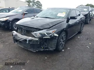2016 Nissan Maxima Platinum with VIN 1N4AA6AP6GC430274, listed as a IAAI auction lot 41443184 with 132,772 mi miles and . Bid and sale history available at DreamBid. Image 2.