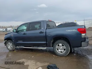 2008 Toyota Tundra z VIN 5TFDV54198X077455, wystawiony jako IAAI lot #41668660 z przebiegiem 164 008 mil mil oraz . Historia ofert i sprzedaży dostępna na DreamBid. Obrazek 14.