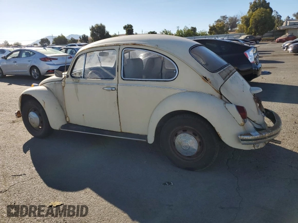 1969 Volkswagen Beetle with VIN 1190494912, listed as a Copart auction lot 75495264 with 67,827 mi miles and Salvage Title. Bid and sale history available at DreamBid. Image 2.