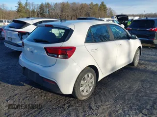 2022 Kia Rio S with VIN 3KPA25AD5NE443465, listed as a IAAI auction lot 41230852 with 20,460 mi miles and . Bid and sale history available at DreamBid. Image 4.