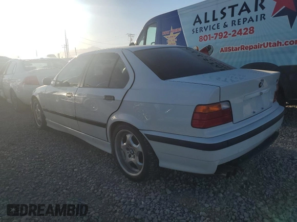 1997 BMW M3 with VIN WBSCD032XVEE11393, listed as a Copart auction lot 72560804 with 195,456 mi miles and Salvage title. Bid and sale history available at DreamBid. Image 2.