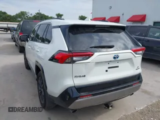 2022 Toyota RAV4 Hybrid SE with VIN 4T3T6RFV4NU065150, listed as a IAAI auction lot 42166772 with 69,868 mi miles and . Bid and sale history available at DreamBid. Image 3.