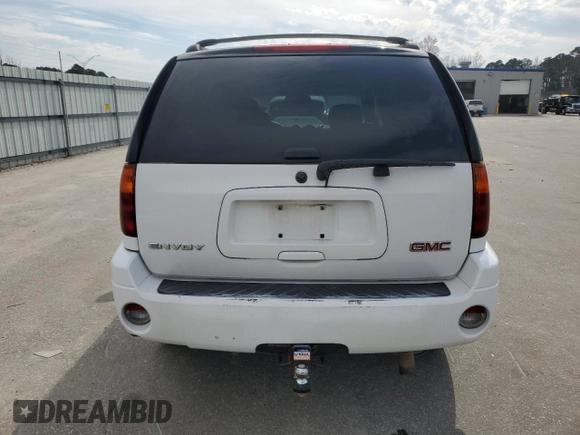 2007 GMC Envoy SLE z VIN 1GKDT13SX72165911, wystawiony jako Copart lot #47059805 z przebiegiem 168 377 mil mil oraz Szkoda całkowita • Salvage title. Historia ofert i sprzedaży dostępna na DreamBid. Obrazek 6.