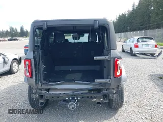 2023 Ford Bronco z VIN 1FMEE5BP5PLA97652, wystawiony jako IAAI lot #42149830 z przebiegiem 19 821 mil mil oraz . Historia ofert i sprzedaży dostępna na DreamBid. Obrazek 17.