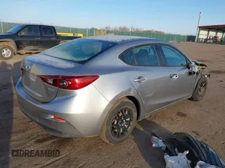 2015 Mazda 3 i Sport with VIN 3MZBM1U74FM214972, listed as a IAAI auction lot 41639561 with 157,597 mi miles. Bid and sale history available at carsss.com. Image 4.