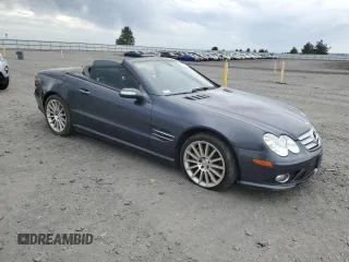 2008 Mercedes-Benz SL 550 with VIN WDBSK71FX8F141468, listed as a Copart auction lot 61036285 with 109,698 mi miles and Salvage title. Bid and sale history available at DreamBid. Image 4.
