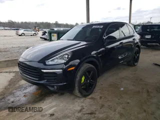 2016 Porsche Cayenne S E-Hybrid z VIN WP1AE2A26GLA17555, wystawiony jako Copart lot #44078415 z przebiegiem 56 830 mil mil oraz Czysty tytuł • Clean title. Historia ofert i sprzedaży dostępna na DreamBid. Obrazek 1.