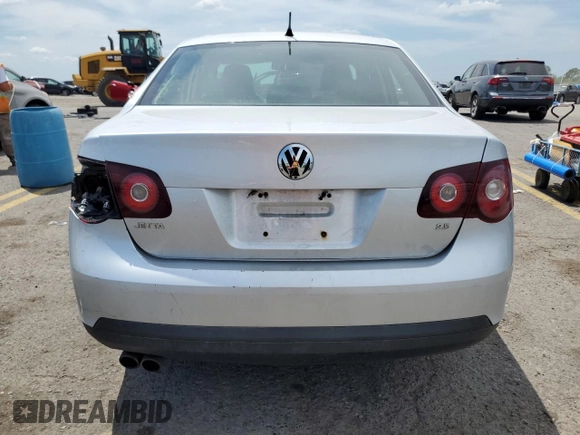2010 Volkswagen Jetta Limited Edition with VIN 3VWRX7AJ6AM146644, listed as a Copart auction lot 84243994 with Not provided miles and Salvage title. Bid and sale history available at DreamBid. Image 6.