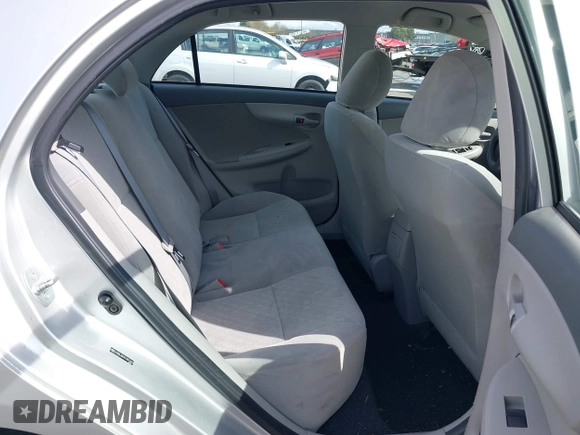 2009 Toyota Corolla with VIN JTDBL40E59J051651, listed as a IAAI auction lot 41874710 with 52,938 mi miles. Bid and sale history available at carsss.com. Image 8.