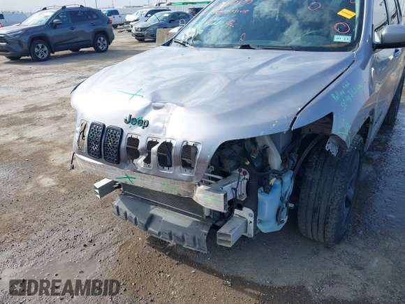 2021 Jeep Cherokee Altitude with VIN 1C4PJLLB6MD112830, listed as a IAAI auction lot 41560135 with 76,760 mi miles. Bid and sale history available at carsss.com. Image 6.