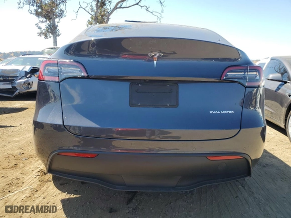 2022 Tesla Model Y Long Range with VIN 7SAYGAEE6NF345053, listed as a Copart auction lot 72465044 with 0 mi miles and Salvage Title. Bid and sale history available at carsss.com. Image 6.