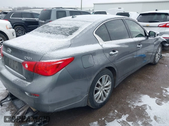 2015 Infiniti Q50 Premium with VIN JN1BV7AR0FM396192, listed as a IAAI auction lot 41564677 with 210,460 mi miles and . Bid and sale history available at DreamBid. Image 4.