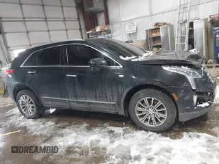 2018 Cadillac XT5 Luxury AWD with VIN 1GYKNDRSXJZ182299, listed as a IAAI auction lot 41628039 with 124,054 mi miles and . Bid and sale history available at DreamBid. Image 13.