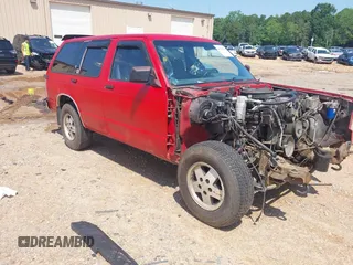 1991 Chevrolet Blazer z VIN 1GNDT13Z2M2233839, wystawiony jako IAAI lot #42436668 z przebiegiem 99 931 mil mil oraz . Historia ofert i sprzedaży dostępna na DreamBid. Obrazek 1.
