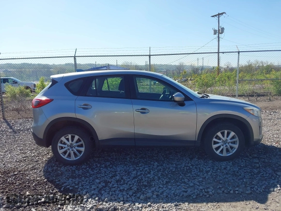 2013 Mazda CX-5 Sport with VIN JM3KE4BE0D0125748, listed as a IAAI auction lot 42143020 with 158,580 mi miles. Bid and sale history available at carsss.com. Image 13.