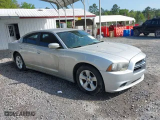 2012 Dodge Charger SE with VIN 2C3CDXBG4CH211517, listed as a IAAI auction lot 41982290 with 269,855 mi miles. Bid and sale history available at carsss.com. Image 1.