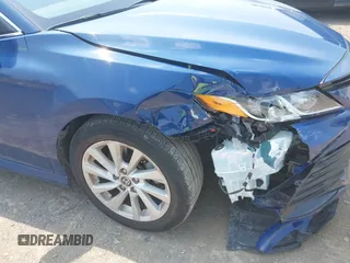 2023 Toyota Camry LE z VIN 4T1R11AK9PU180068, wystawiony jako IAAI lot #42483656 z przebiegiem 59 312 mil mil oraz . Historia ofert i sprzedaży dostępna na DreamBid. Obrazek 6.