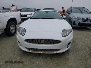 2014 Jaguar XK with VIN SAJWA4GB0ELB53770, listed as a Copart auction lot 74255294 with 0 mi miles and Salvage Title. Bid and sale history available at carsss.com. Image 5.