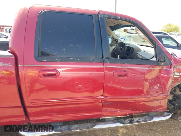 2002 Ford F-150 XLT with VIN 1FTRW07682KC33857, listed as a IAAI auction lot 41870137 with 185,480 mi miles. Bid and sale history available at carsss.com. Image 14.