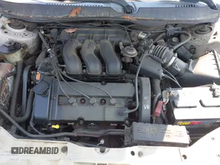 2002 Mercury Sable LS Premium with VIN 1MEFM55S52A600384, listed as a IAAI auction lot 41960299 with 215,998 mi miles and . Bid and sale history available at DreamBid. Image 10.