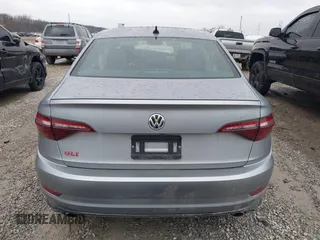 2020 Volkswagen Jetta GLI S z VIN 3VW6T7BU9LM011281, wystawiony jako IAAI lot #41576884 z przebiegiem 66 252 mil mil oraz . Historia ofert i sprzedaży dostępna na DreamBid. Obrazek 17.