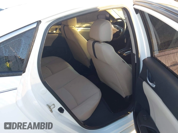 2019 Honda Civic LX with VIN 19XFC2F61KE014007, listed as a IAAI auction lot 41795070 with 64,259 mi miles and . Bid and sale history available at DreamBid. Image 8.