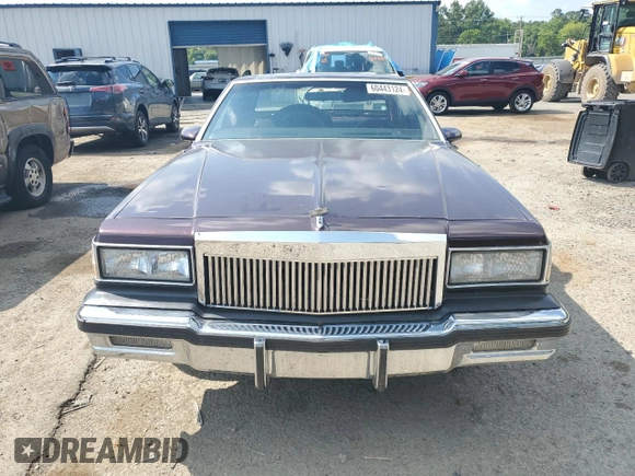 1987 Chevrolet Caprice z VIN 1G1BU51H7H9156079, wystawiony jako Copart lot #60443124 z przebiegiem 44 452 mil mil oraz Szkoda całkowita • Salvage title. Historia ofert i sprzedaży dostępna na DreamBid. Obrazek 5.